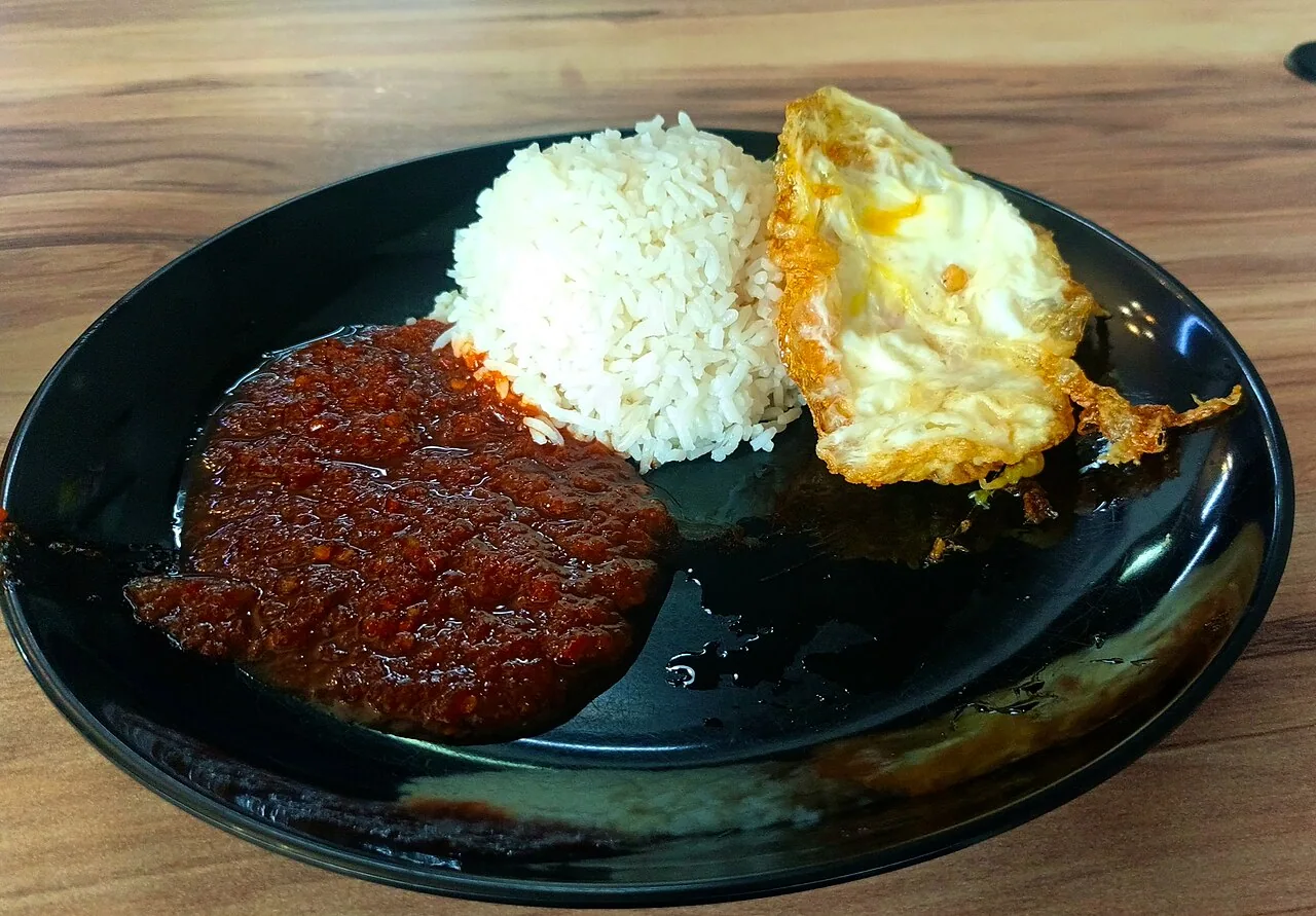 Nasi lemak with sambal and a fried egg in Negeri Sembilan, Malaysia