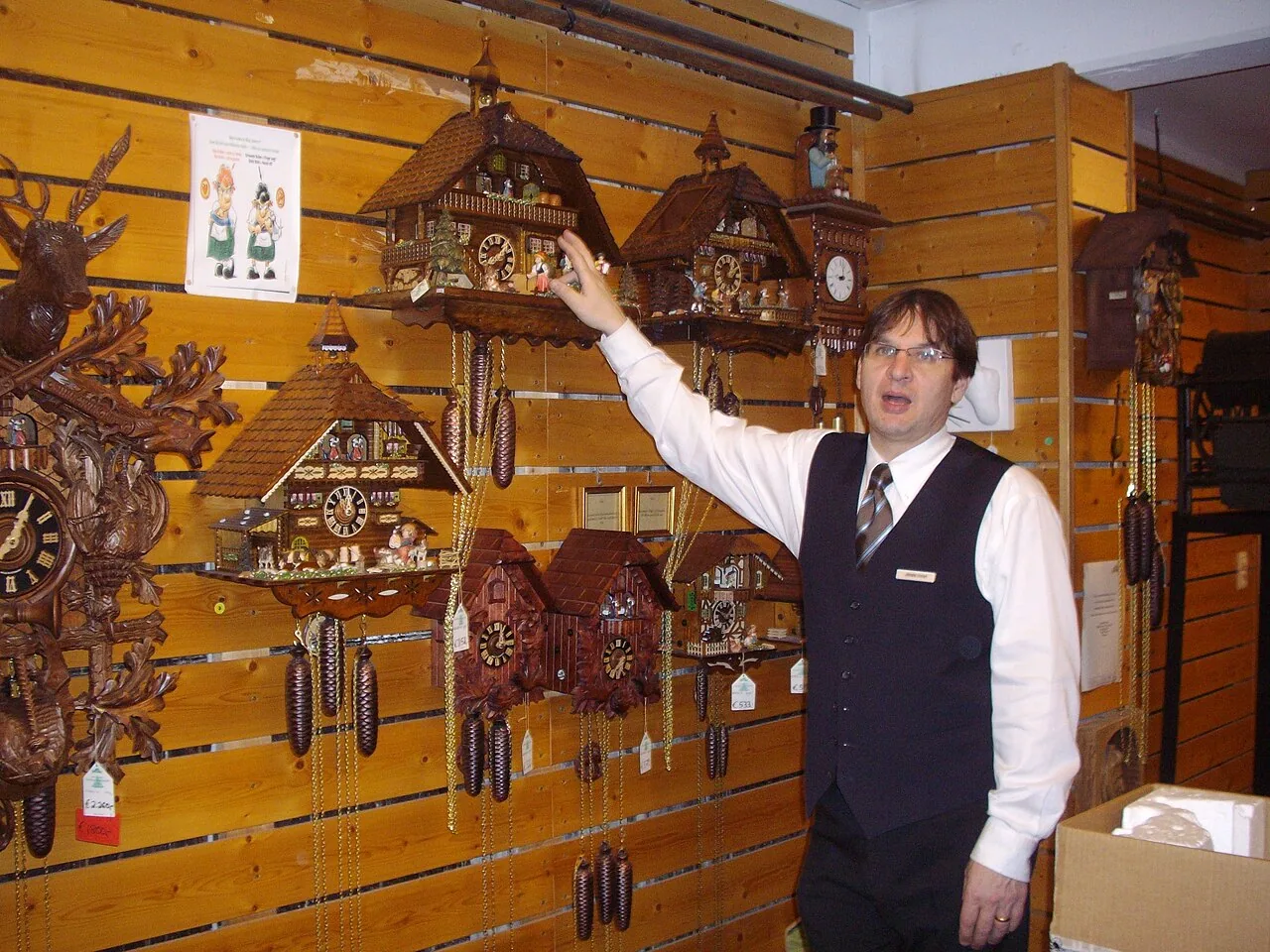 Demonstration of cuckoo clocks at the Drubba clock shop in Titisee, Black Forest