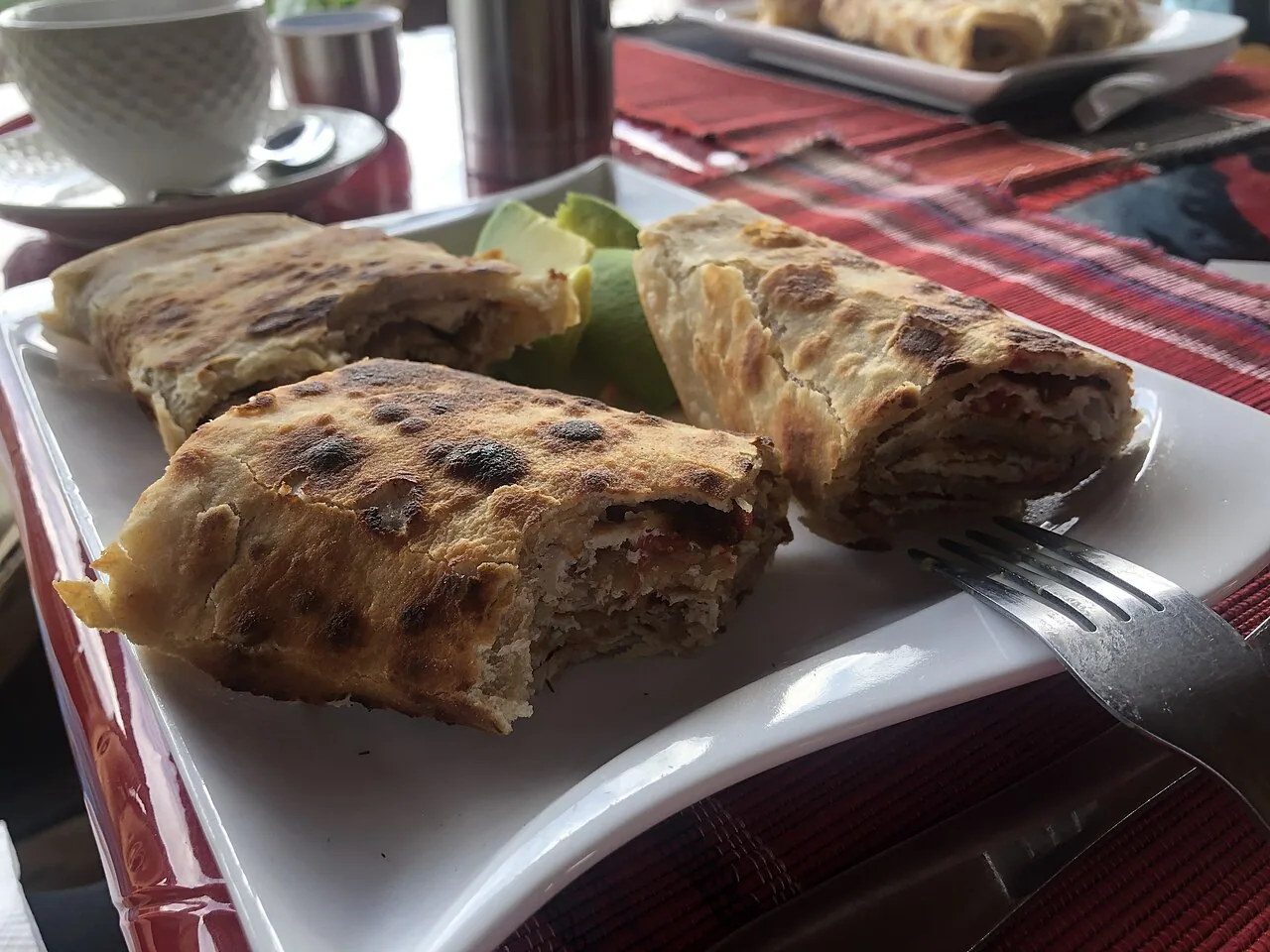 A rolex chapati and omelette breakfast wrap in Mbale, Uganda