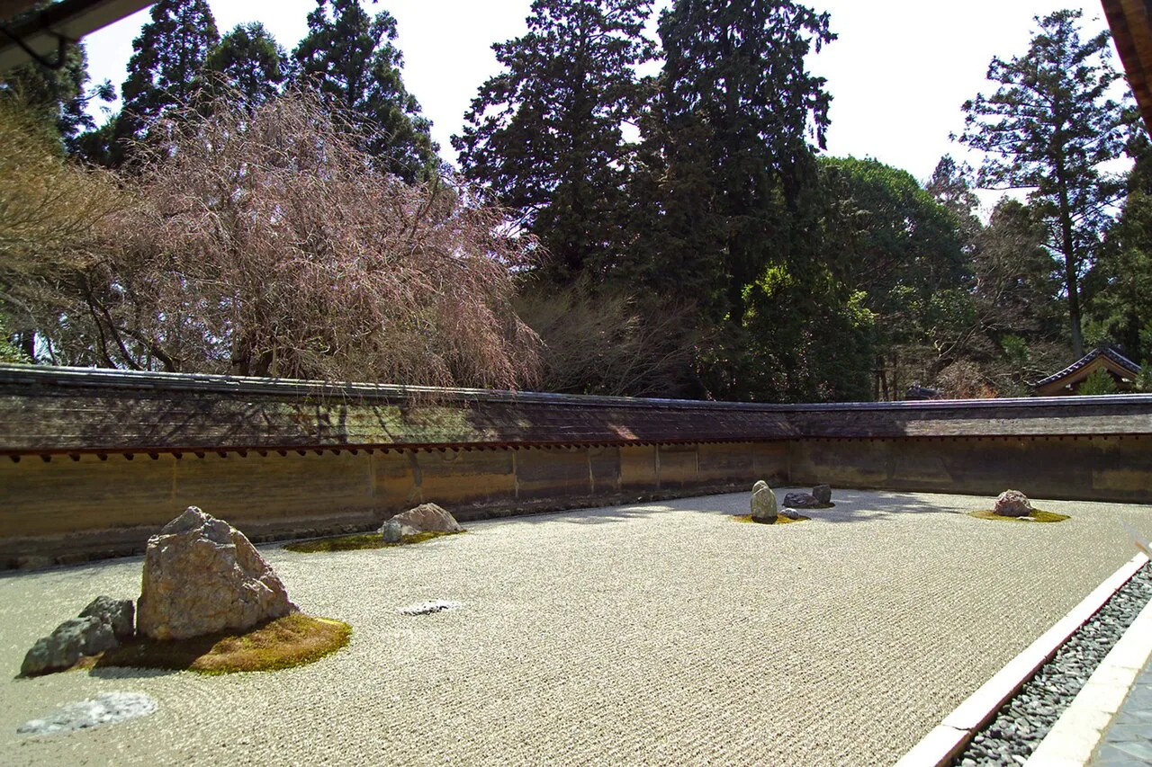 Raked gravel and rocks in the Zen garden at Ryoan-ji temple, Kyoto