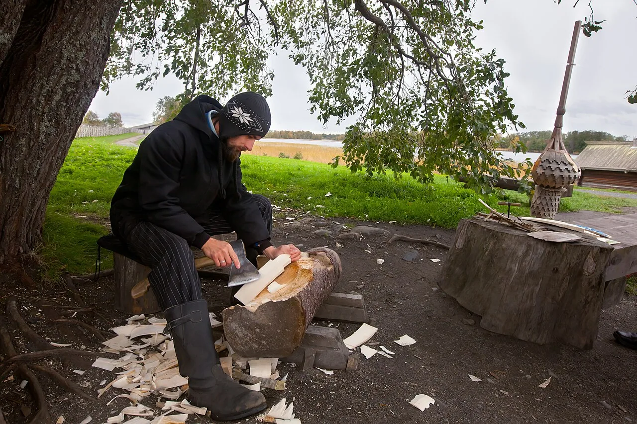 A carpenter making traditional wooden roof shingles on Kizhi Island, Karelia